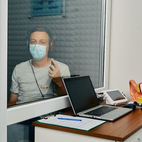 Adult Man Getting A Hearing Test At Audiology Center. Audiometry, Hearing Check Up