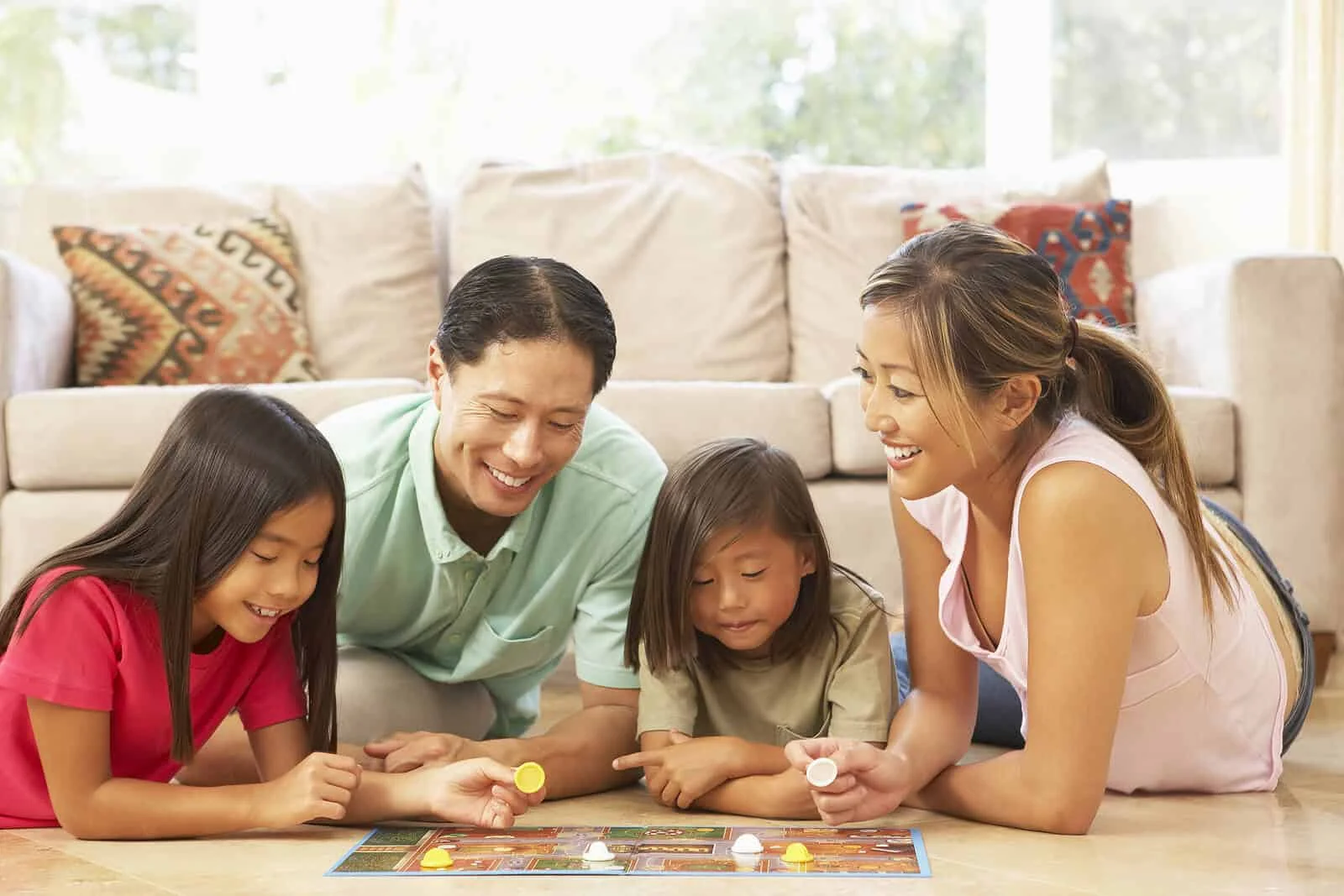 bigstock-Family-Playing-Board-Game-At-H-13907909